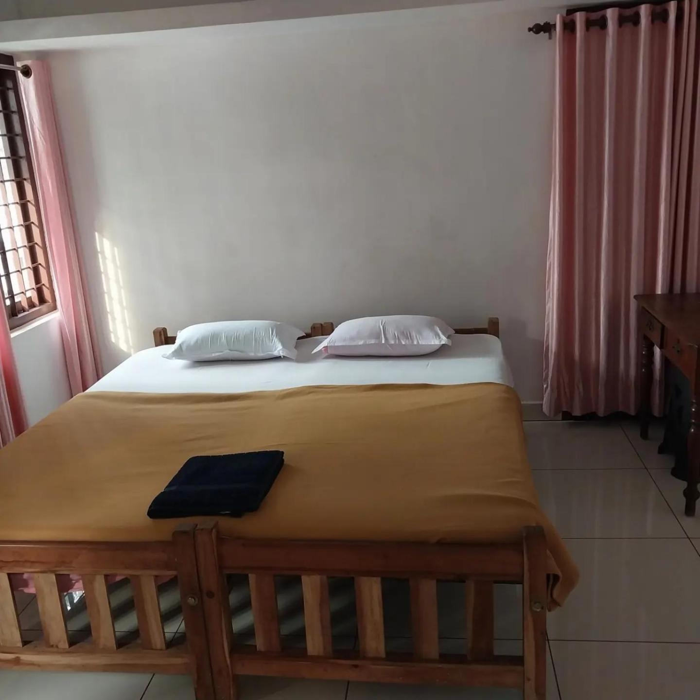 Lloydskochi Home Stay Szoba fotó